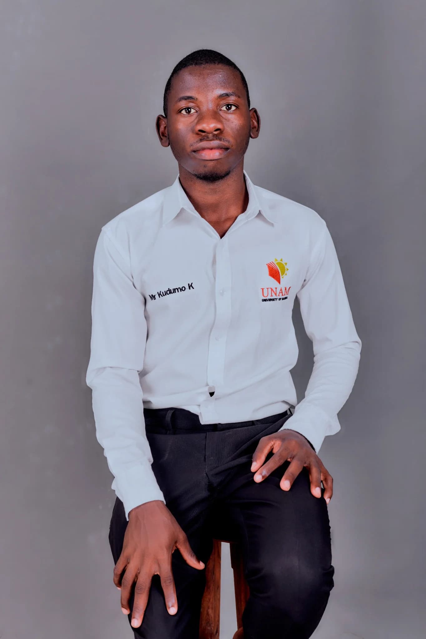 Kudumo Kupembona Andreas in University of Namibia shirt